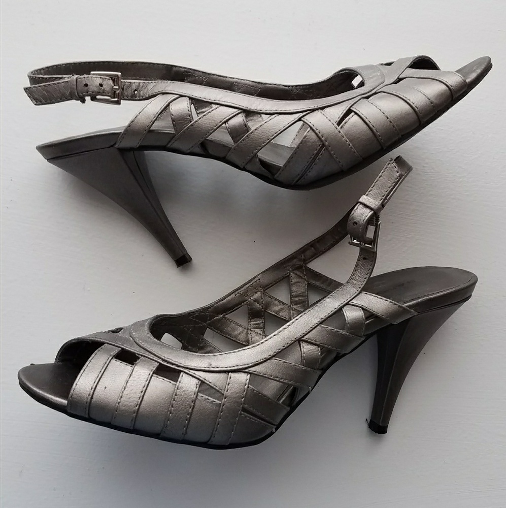 Beautiful open toe slingback heels.